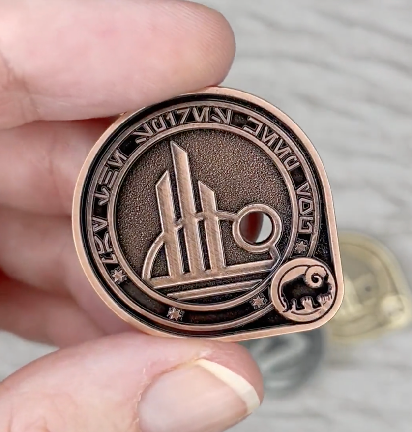 Til the Spire coins
